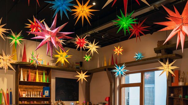 Colourful Moravian Stars hanging from the ceiling