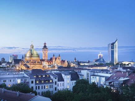 Panoramic view of Leipzig's skyline in the evening