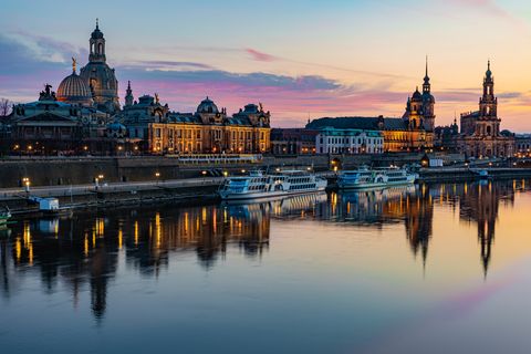 View of the skyline of Dresden reflecting in the river Elbe